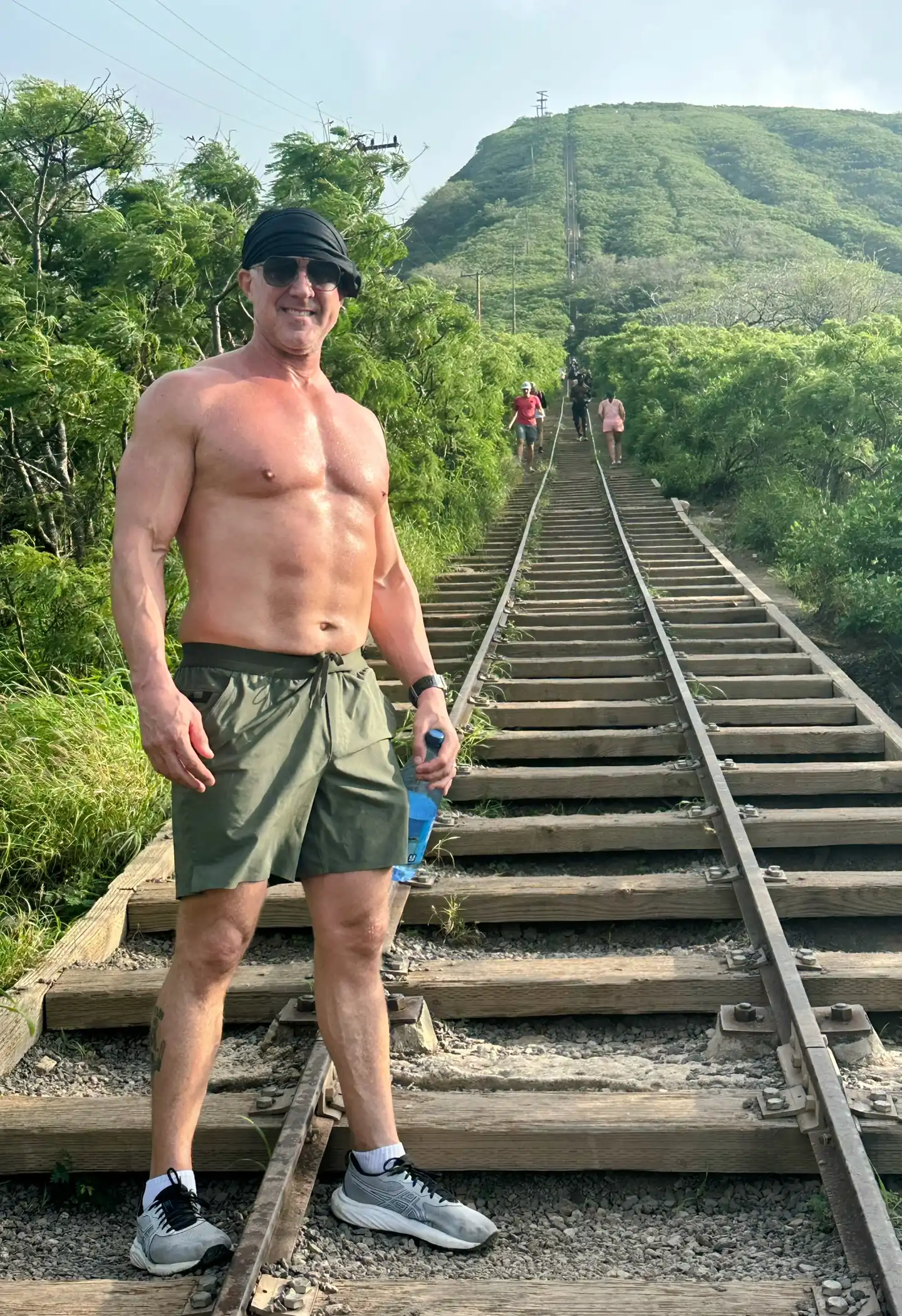 Man walking up outdoor stairs